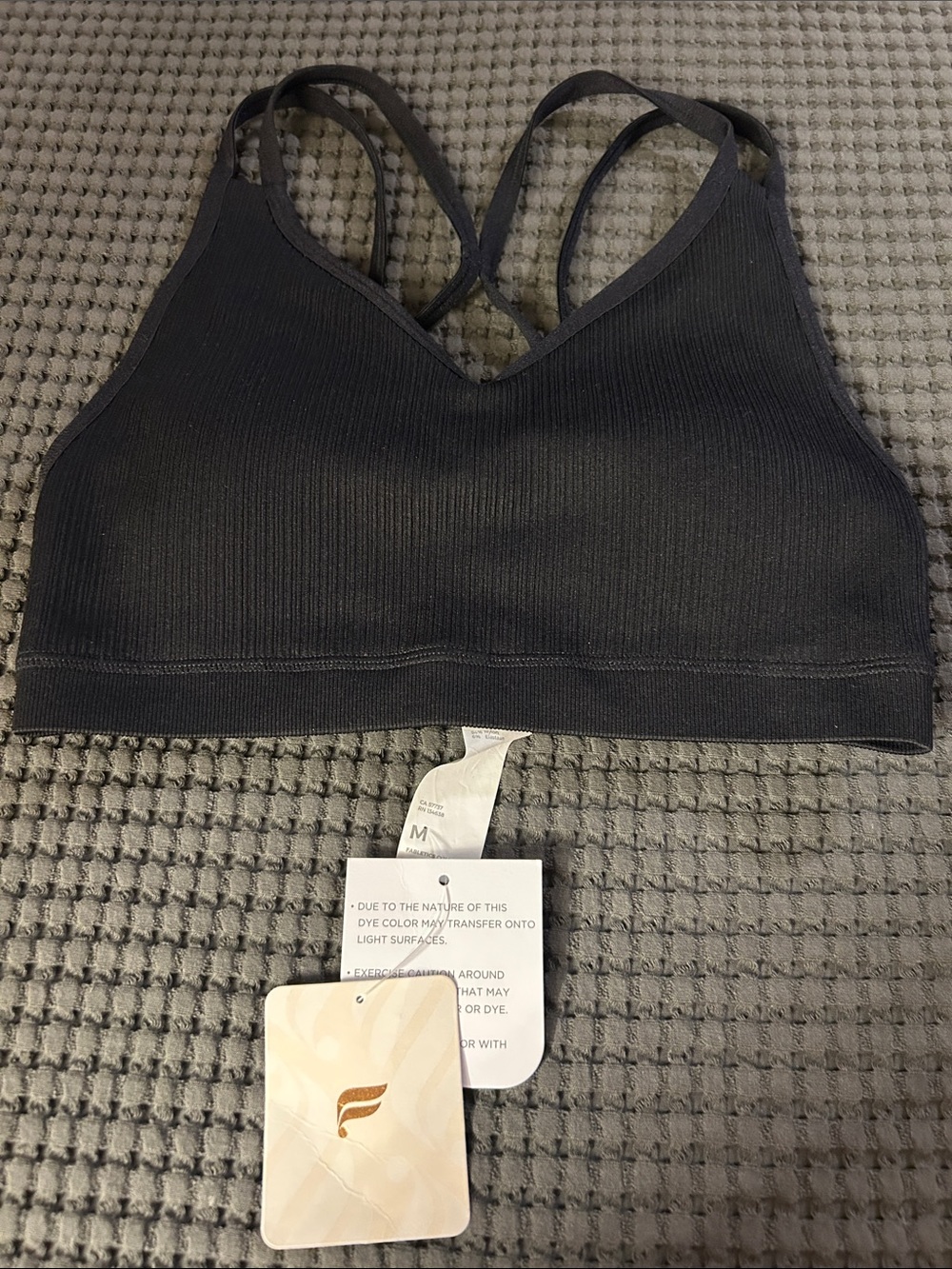 Fabletics black low impact seamless strappy  Sports Bra Size M